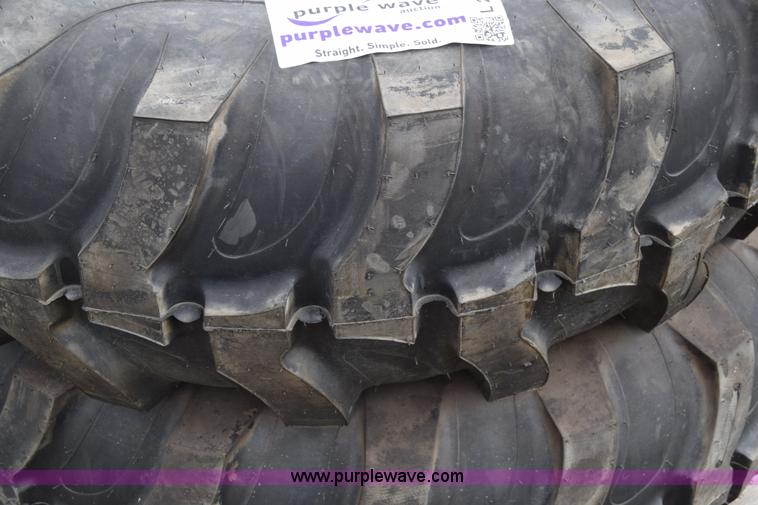 image for item L2624 (2) 14.9-24 tractor tires and wheels