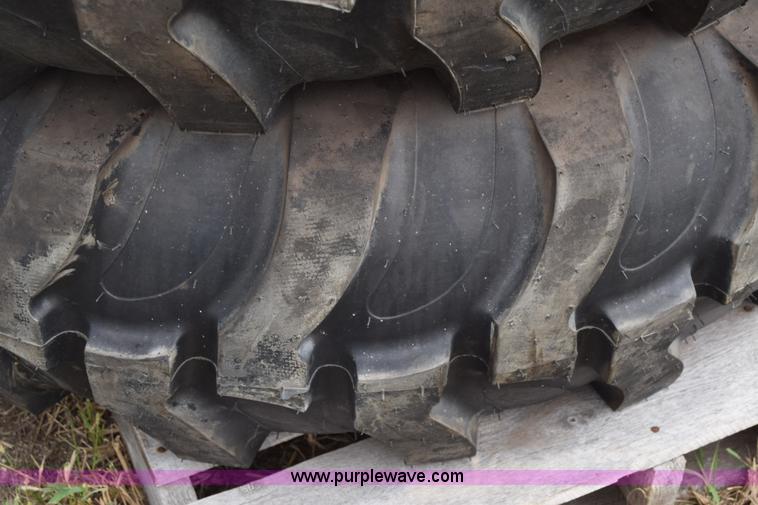 image for item L2624 (2) 14.9-24 tractor tires and wheels