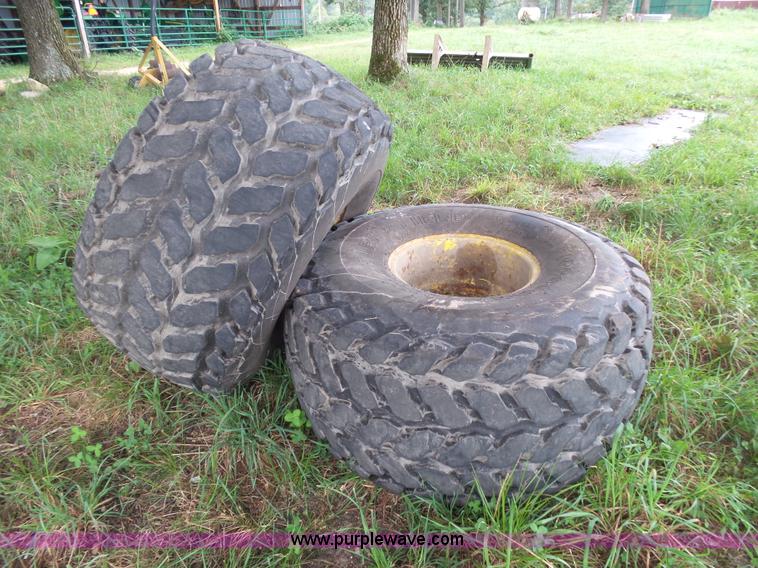 image for item BM9663 (2) Firestone 21.5L-16.1 turf tires and wheels