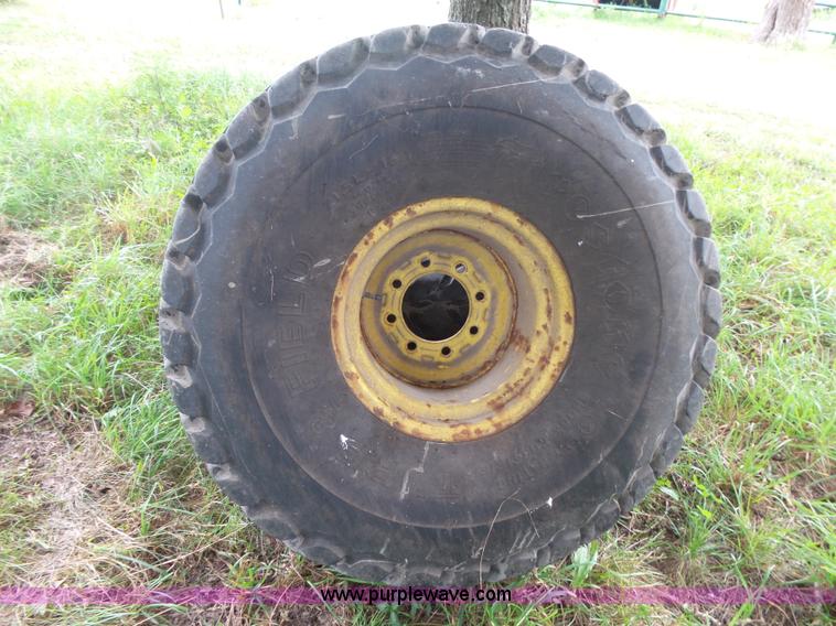 image for item BM9663 (2) Firestone 21.5L-16.1 turf tires and wheels