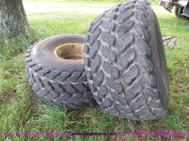 image for item BM9663 (2) Firestone 21.5L-16.1 turf tires and wheels