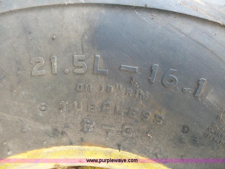 image for item BM9663 (2) Firestone 21.5L-16.1 turf tires and wheels