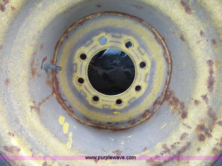 image for item BM9663 (2) Firestone 21.5L-16.1 turf tires and wheels