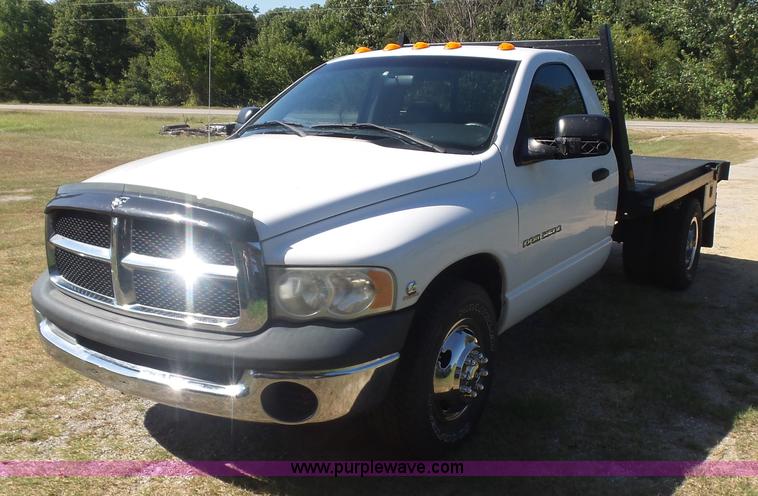image for item CD9393 2005 Dodge Ram 3500 flatbed pickup truck