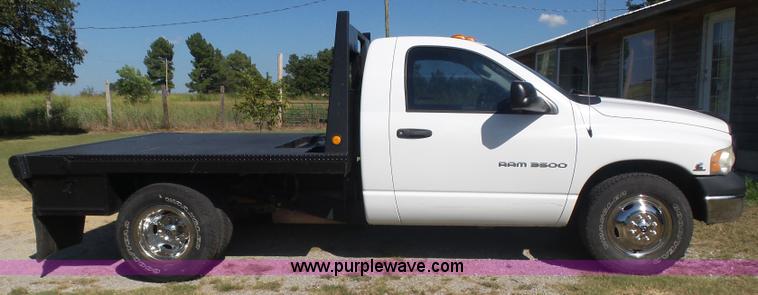 image for item CD9393 2005 Dodge Ram 3500 flatbed pickup truck