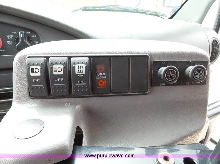 image for item DB4511 2005 Ford E450 Super Duty Girardin shuttle bus