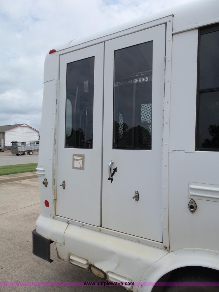 image for item DB4511 2005 Ford E450 Super Duty Girardin shuttle bus