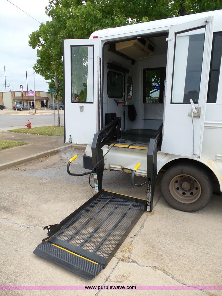 image for item DB4511 2005 Ford E450 Super Duty Girardin shuttle bus