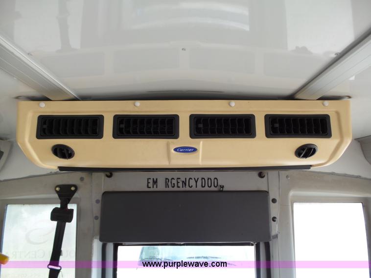 image for item DB4512 2006 Ford E450 Super Duty Girardin shuttle bus