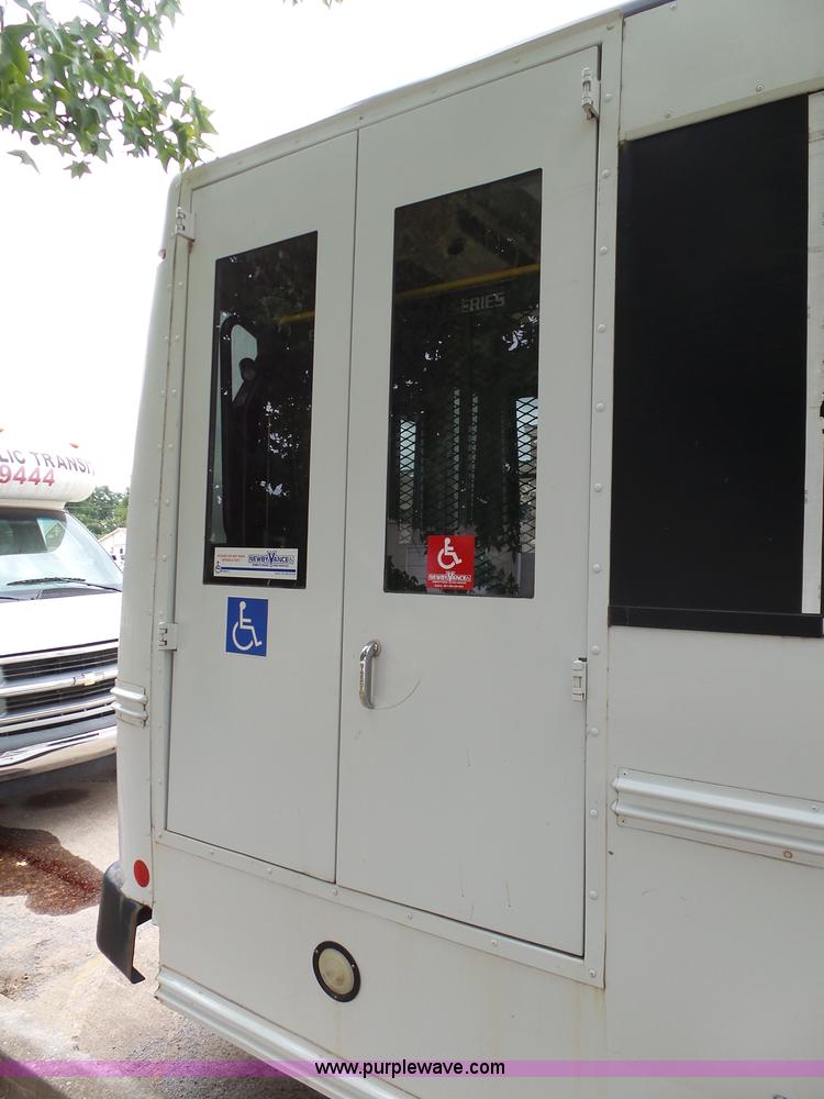 image for item DB4512 2006 Ford E450 Super Duty Girardin shuttle bus