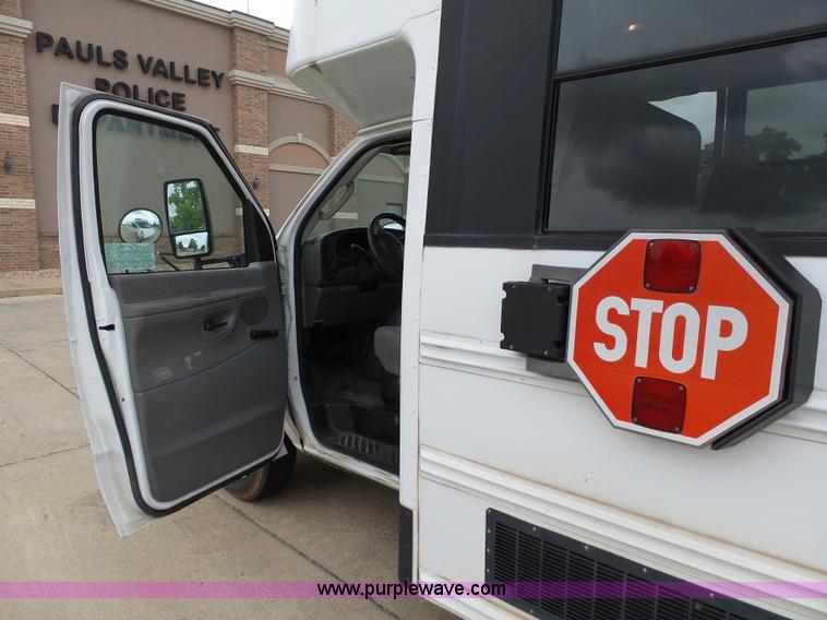image for item DB4514 2006 Ford E450 Super Duty Girardin shuttle bus