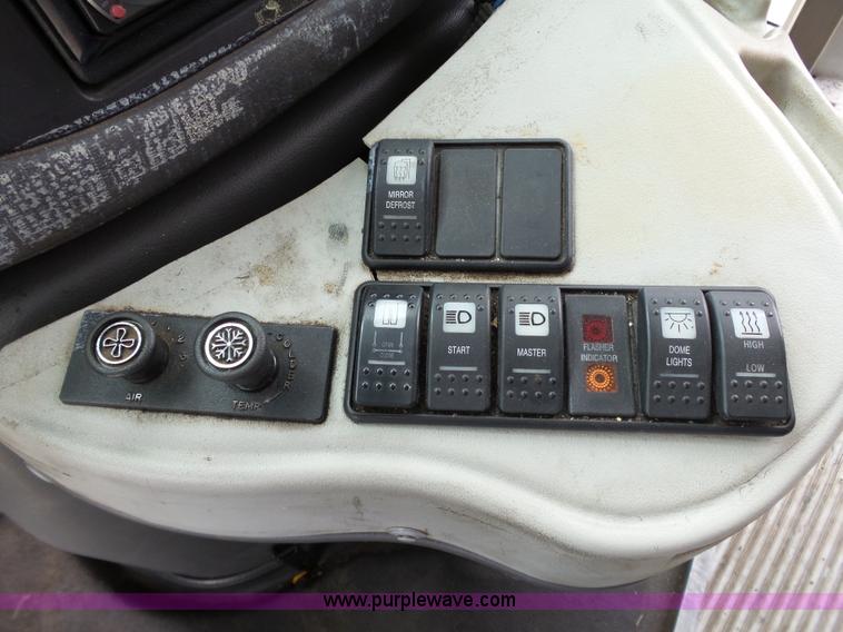 image for item DB4514 2006 Ford E450 Super Duty Girardin shuttle bus