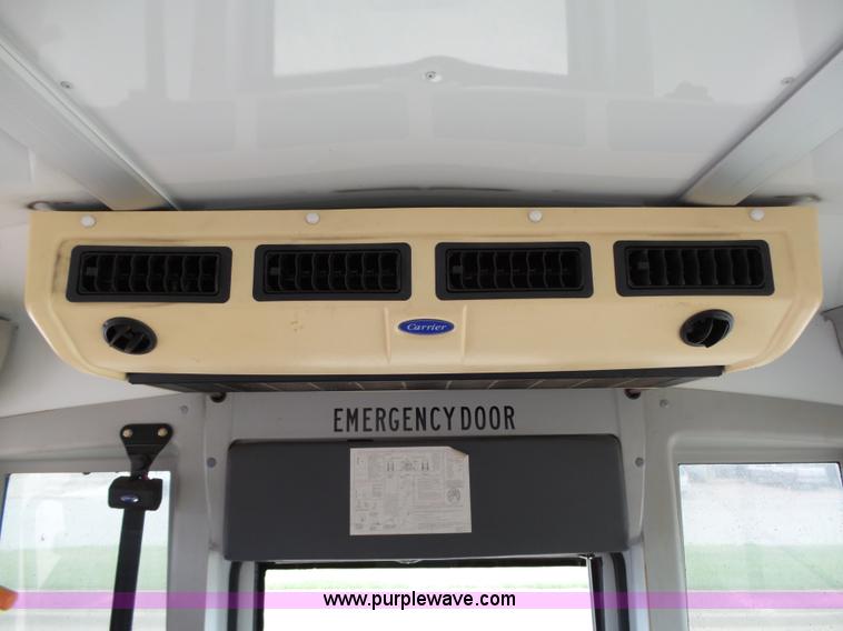 image for item DB4514 2006 Ford E450 Super Duty Girardin shuttle bus