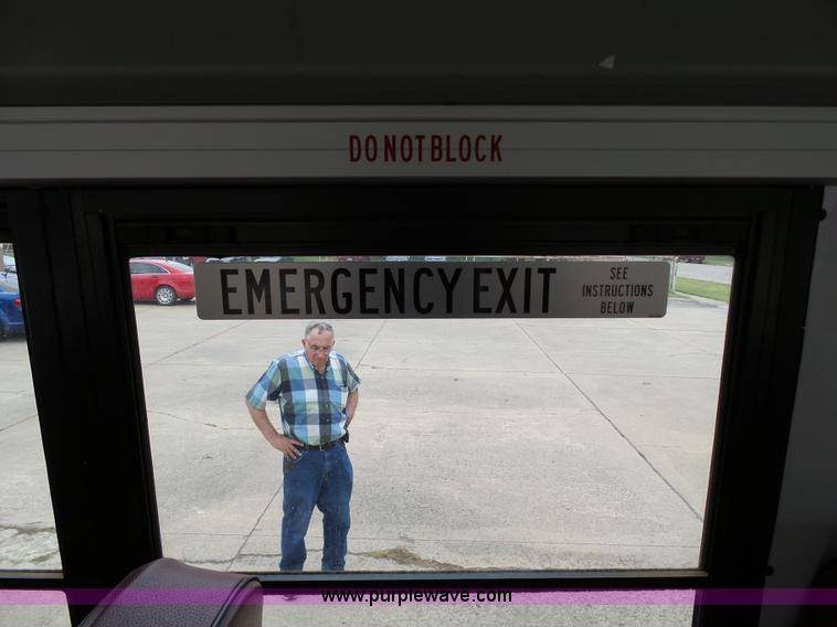 image for item DB4514 2006 Ford E450 Super Duty Girardin shuttle bus