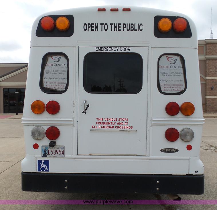 image for item DB4515 2005 Ford E450 Super Duty shuttle bus