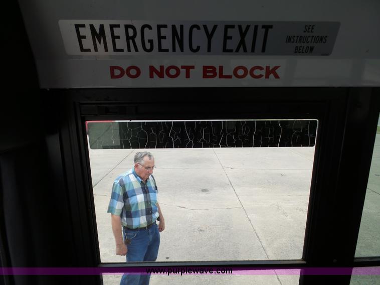 image for item DB4515 2005 Ford E450 Super Duty shuttle bus