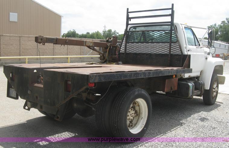 image for item J2755 1989 Ford F700F flatbed truck with crane