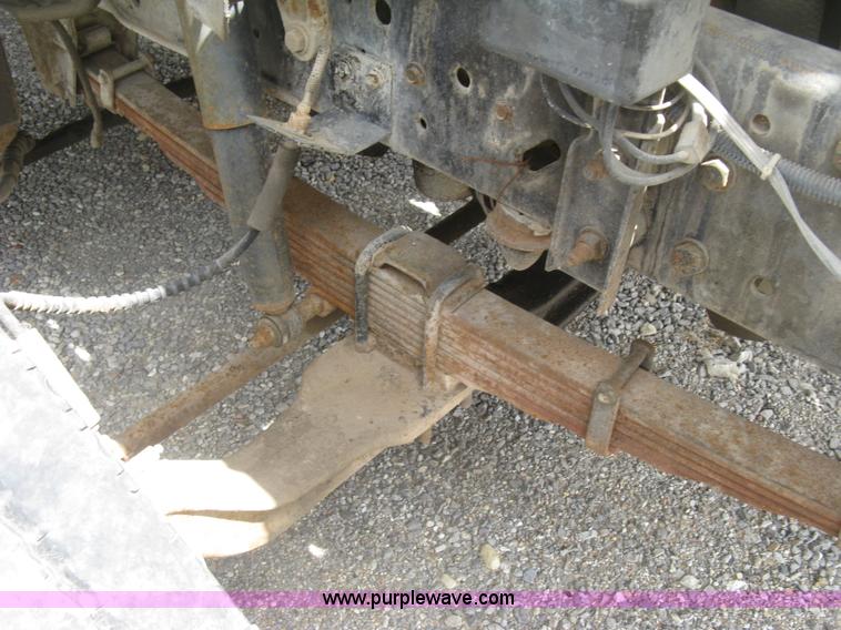 image for item J2755 1989 Ford F700F flatbed truck with crane