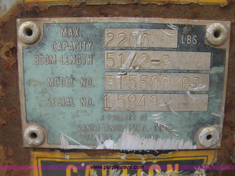 image for item J2755 1989 Ford F700F flatbed truck with crane