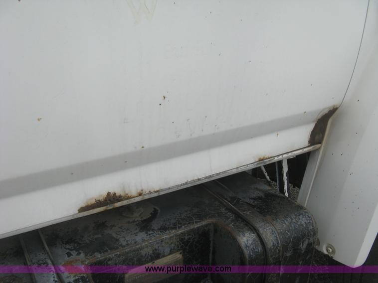 image for item J2755 1989 Ford F700F flatbed truck with crane