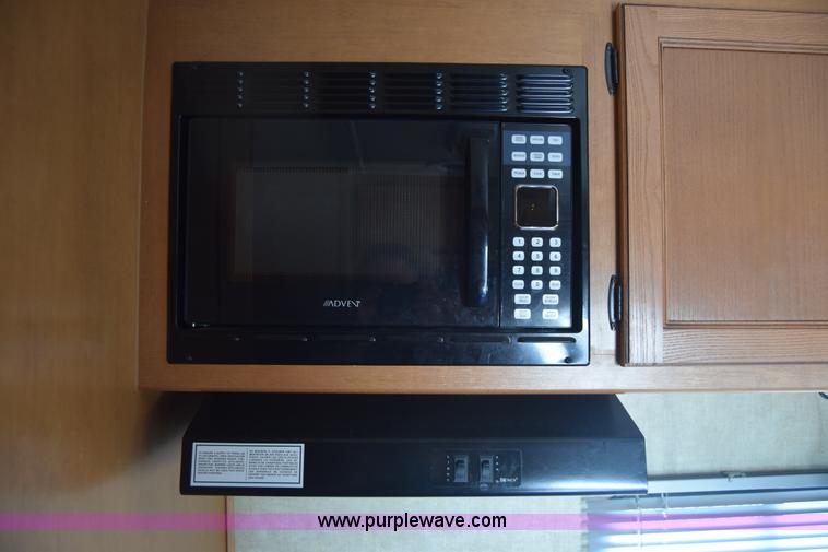 image for item K2841 2014 Chevrolet Express G4500 Coachman Freelander RV