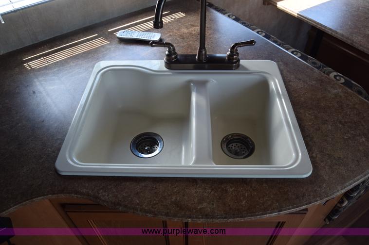 image for item K2841 2014 Chevrolet Express G4500 Coachman Freelander RV