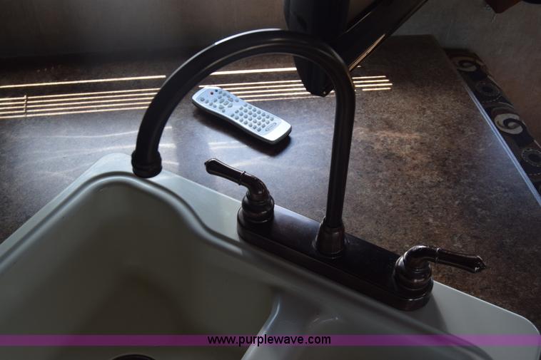 image for item K2841 2014 Chevrolet Express G4500 Coachman Freelander RV