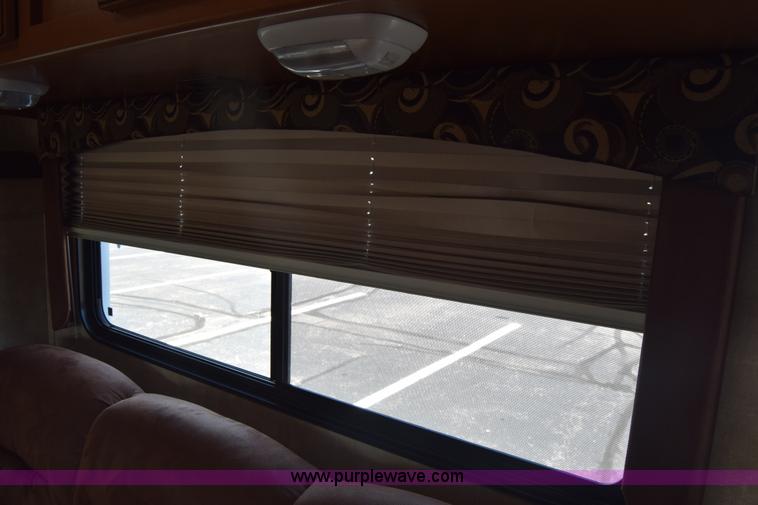 image for item K2841 2014 Chevrolet Express G4500 Coachman Freelander RV