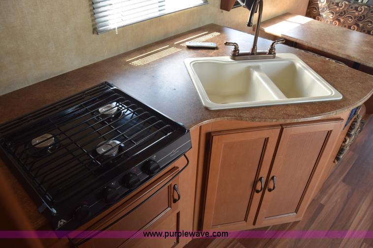 image for item K2841 2014 Chevrolet Express G4500 Coachman Freelander RV