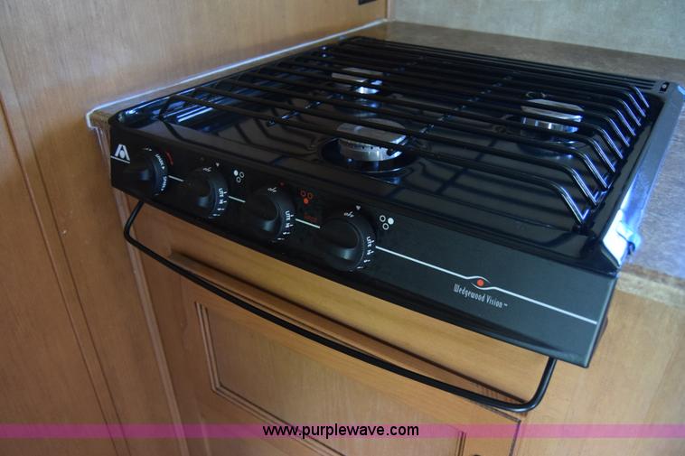 image for item K2841 2014 Chevrolet Express G4500 Coachman Freelander RV