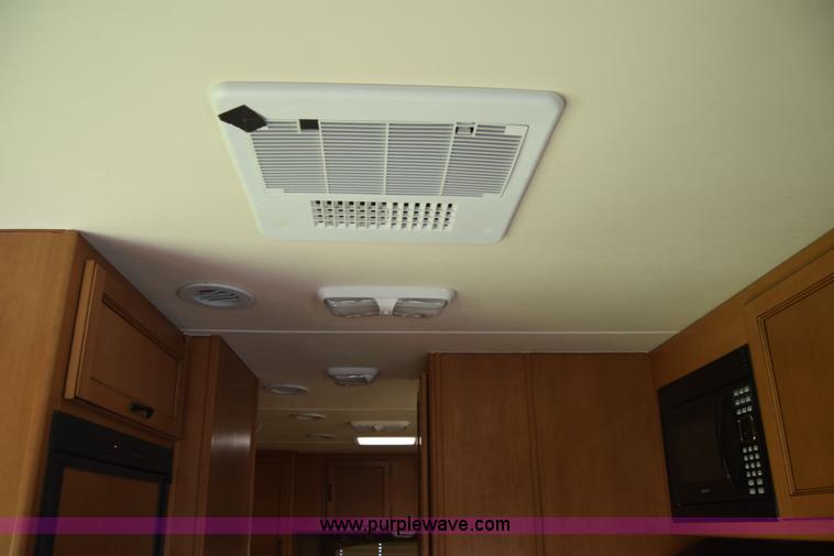 image for item K2841 2014 Chevrolet Express G4500 Coachman Freelander RV