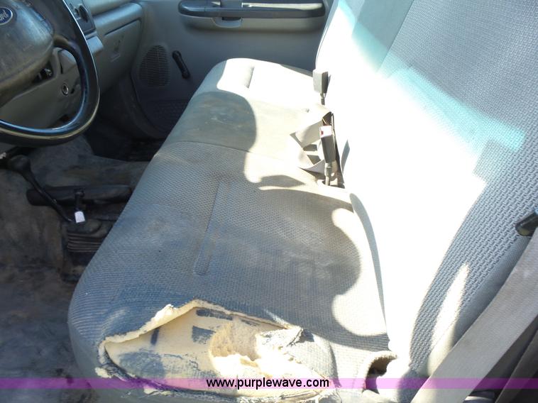 image for item K3154 2006 Ford F250 Super Duty SuperCab flatbed pickup truck