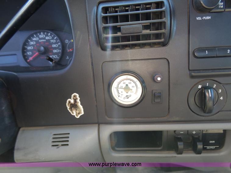 image for item K3154 2006 Ford F250 Super Duty SuperCab flatbed pickup truck