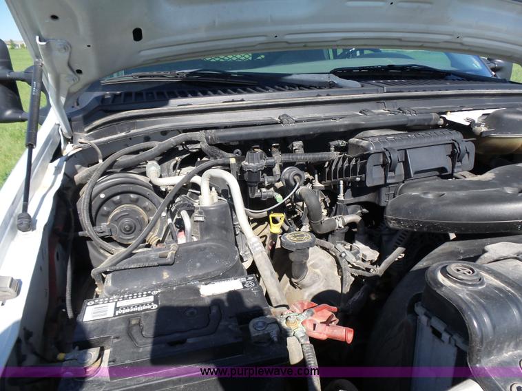 image for item K3154 2006 Ford F250 Super Duty SuperCab flatbed pickup truck