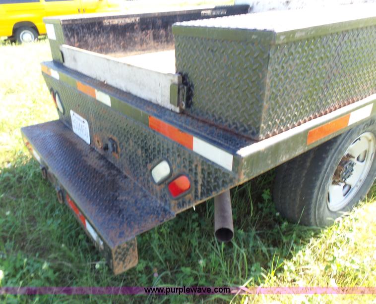 image for item K3154 2006 Ford F250 Super Duty SuperCab flatbed pickup truck