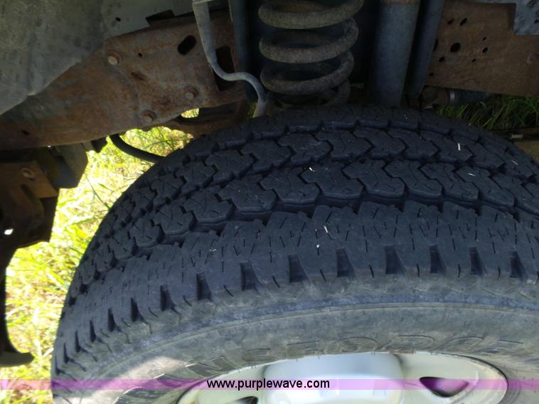 image for item K3154 2006 Ford F250 Super Duty SuperCab flatbed pickup truck