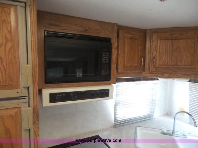 image for item K3612 1994 Fleetwood Westport camper