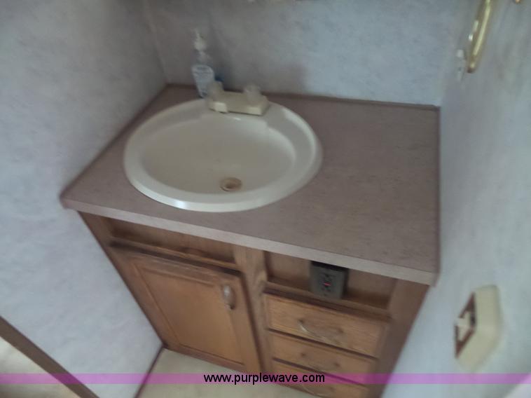 image for item K3612 1994 Fleetwood Westport camper