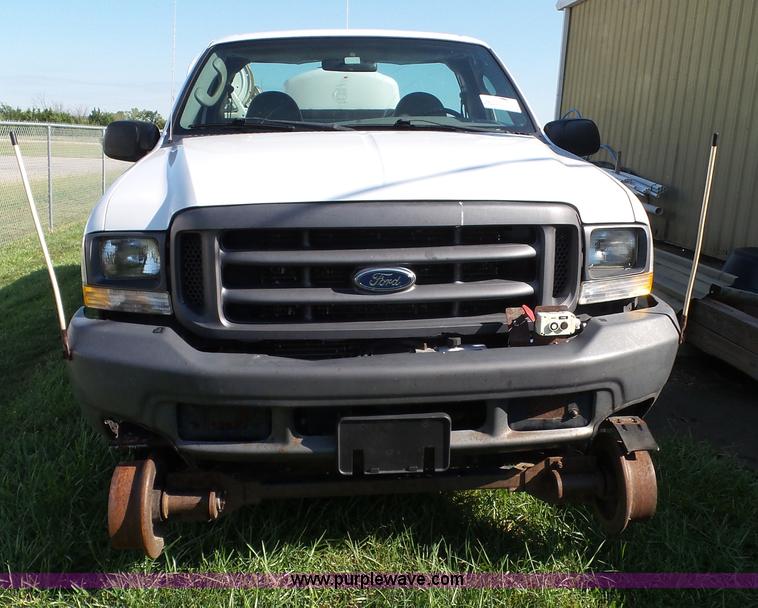 image for item K8242 2004 Ford F350 Super Duty XL utility truck with Hi-Rail/Road rail
