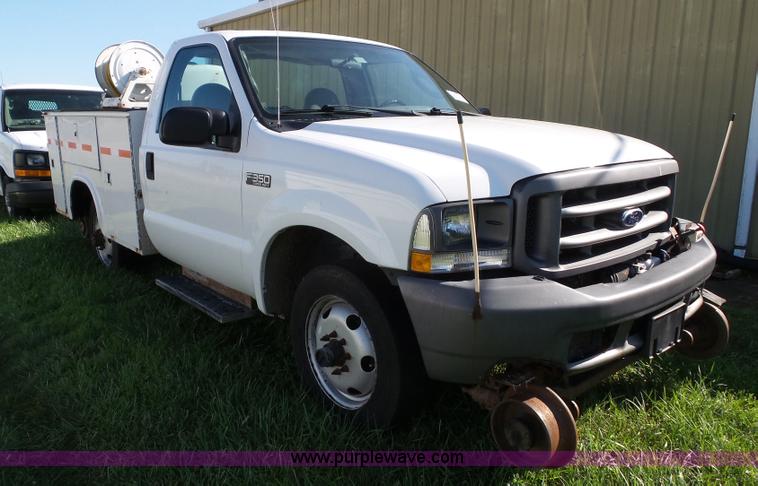 image for item K8242 2004 Ford F350 Super Duty XL utility truck with Hi-Rail/Road rail