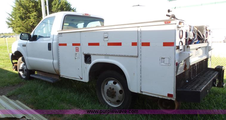 image for item K8242 2004 Ford F350 Super Duty XL utility truck with Hi-Rail/Road rail