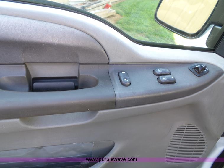 image for item K8242 2004 Ford F350 Super Duty XL utility truck with Hi-Rail/Road rail