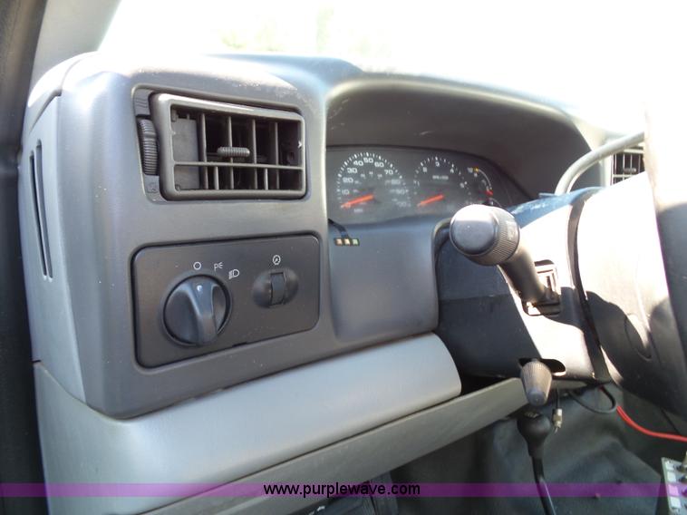 image for item K8242 2004 Ford F350 Super Duty XL utility truck with Hi-Rail/Road rail