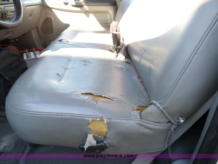 image for item K8242 2004 Ford F350 Super Duty XL utility truck with Hi-Rail/Road rail