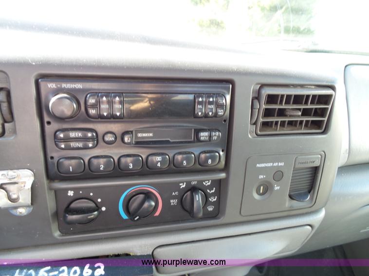 image for item K8242 2004 Ford F350 Super Duty XL utility truck with Hi-Rail/Road rail