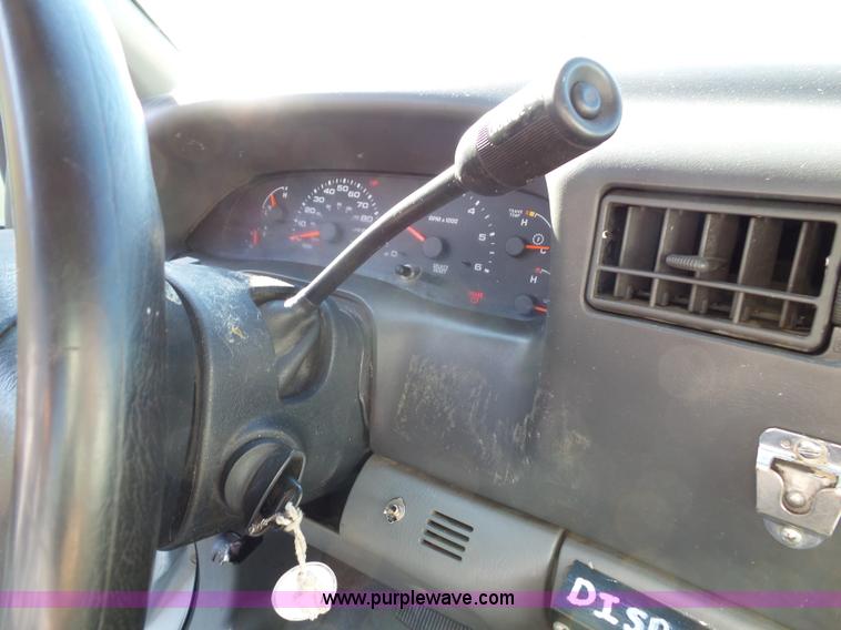 image for item K8242 2004 Ford F350 Super Duty XL utility truck with Hi-Rail/Road rail