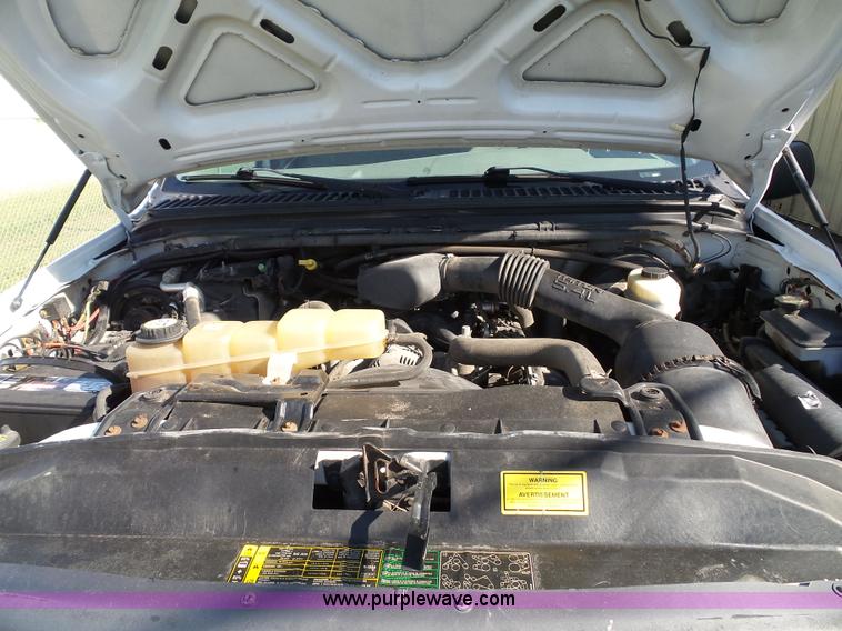 image for item K8242 2004 Ford F350 Super Duty XL utility truck with Hi-Rail/Road rail