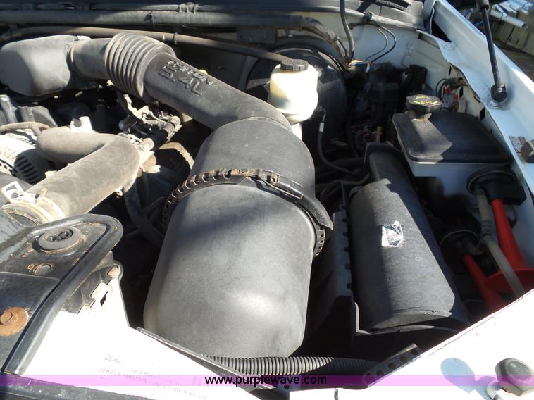 image for item K8242 2004 Ford F350 Super Duty XL utility truck with Hi-Rail/Road rail