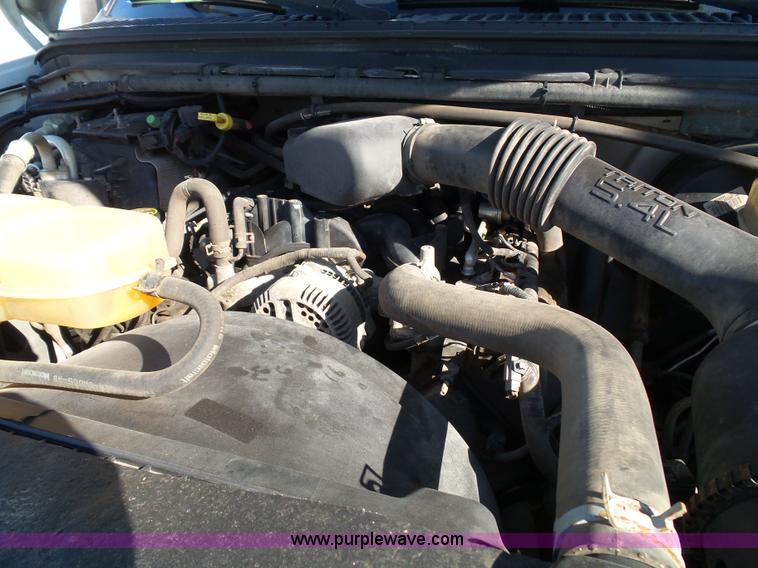 image for item K8242 2004 Ford F350 Super Duty XL utility truck with Hi-Rail/Road rail