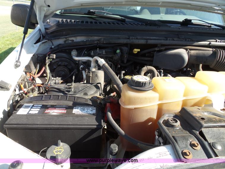 image for item K8242 2004 Ford F350 Super Duty XL utility truck with Hi-Rail/Road rail